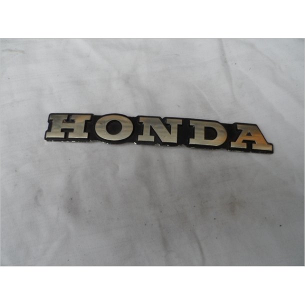 Honda emblem brugt guld,med tappe bag. L=180