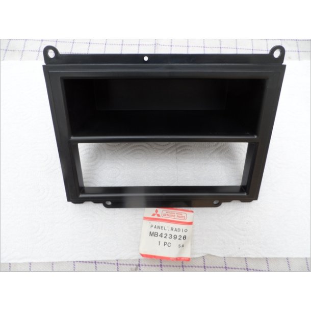 Mitsubishi plast panel under radio.MR423926